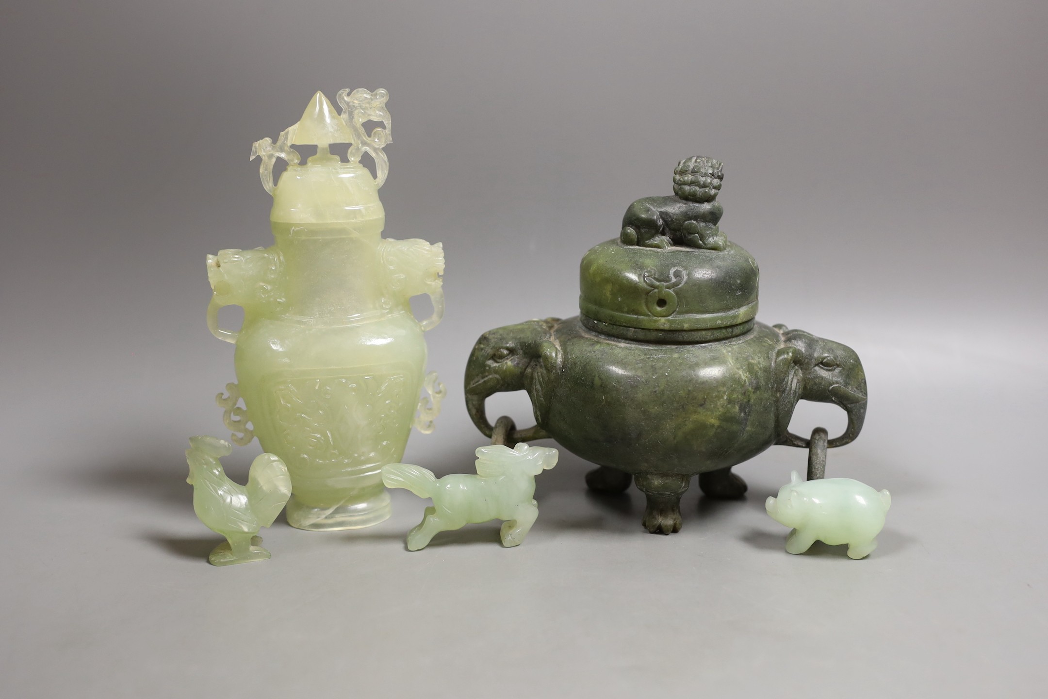 A Chinese green soapstone tripod censer and cover and a group of Chinese bowenite jade carvings- censer 14 cms high.